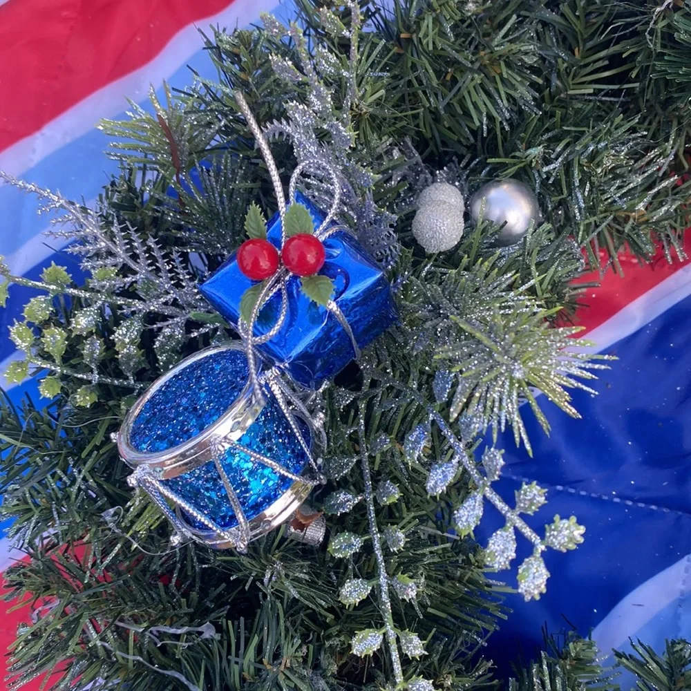 Evergreen Wreath Trimmed with silver and blue and pine ones